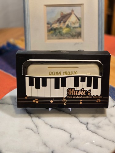 Dliga music mini handheld - dliga,
